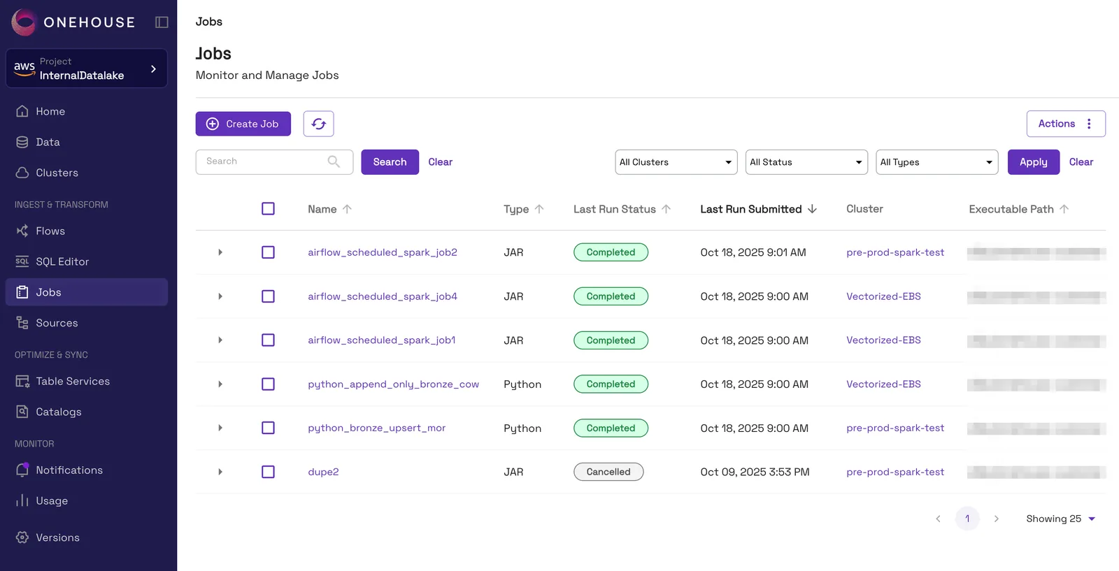 The Jobs page in the Onehouse console, listing JAR and Python jobs with their last run status and assigned cluster.