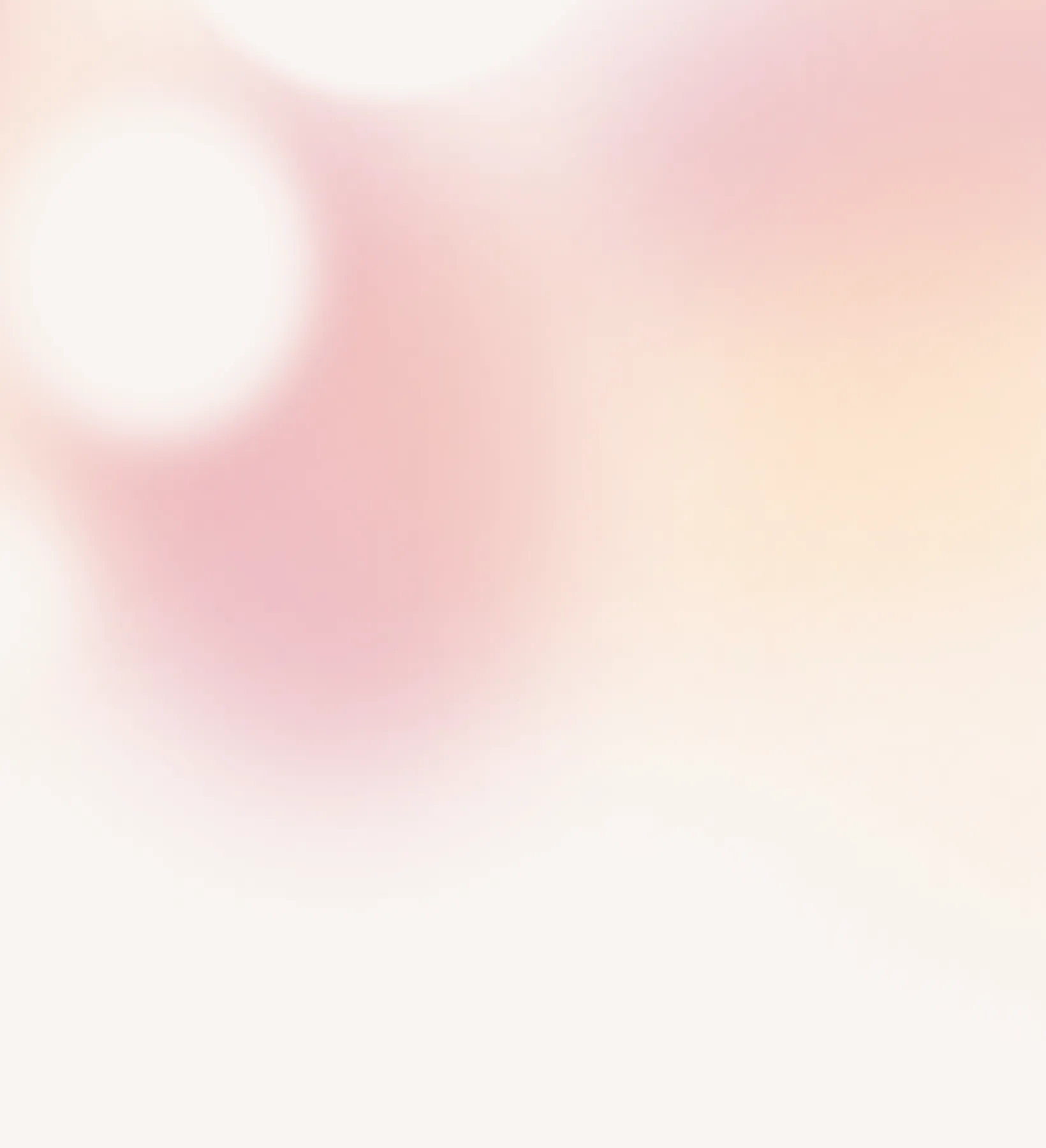 A blurry image of a white and pink background.